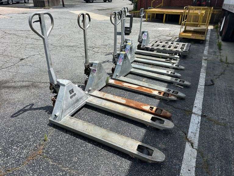 Six Pallet Jacks (some inoperable)