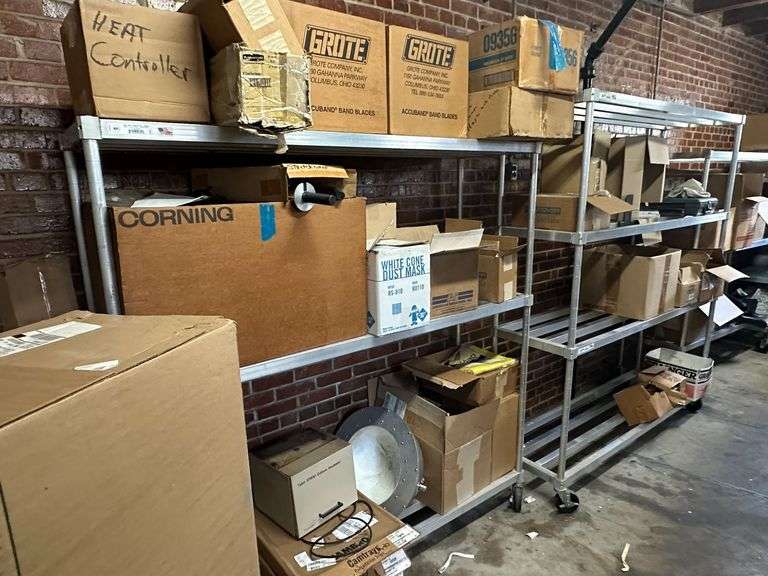 Contents of New Stock Room includes New Steel Toe Rubber Boots, New Gloves, New Food Trays, New Floor Mats, New Protective Face Sheilds, New Carts, and all Shelving