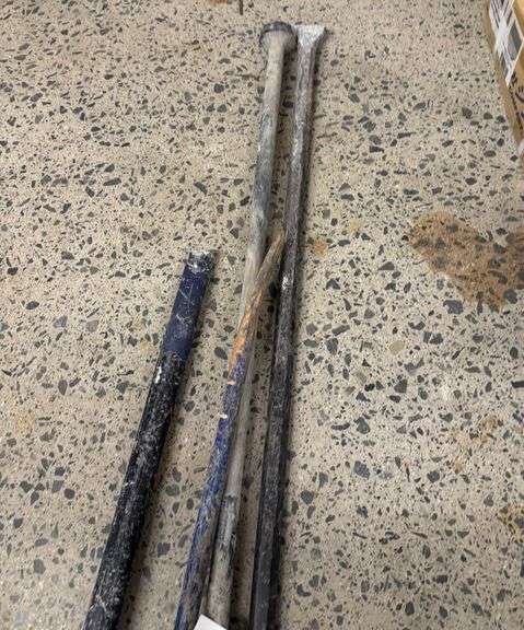 Grouping of Pry Bars and Sledge Hammer