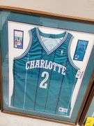 Larry Johnson Autographed Framed and Matted Charlotte Hornets Jersey (Front Signature)