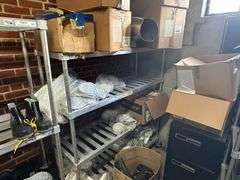 Contents of New Stock Room includes New Steel Toe Rubber Boots, New Gloves, New Food Trays, New Floor Mats, New Protective Face Sheilds, New Carts, and all Shelving