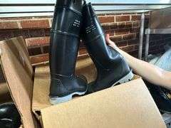Contents of New Stock Room includes New Steel Toe Rubber Boots, New Gloves, New Food Trays, New Floor Mats, New Protective Face Sheilds, New Carts, and all Shelving