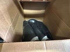 Contents of New Stock Room includes New Steel Toe Rubber Boots, New Gloves, New Food Trays, New Floor Mats, New Protective Face Sheilds, New Carts, and all Shelving