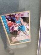 Tyrone "Muggsy" Bogues Autographed Framed and Matted Charlotte Hornets Jersey