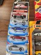 Grouping of 1:64 Scale Matchbox and Hot Wheel Die Cast Cars