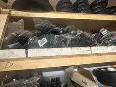 Lot of Racks of Mower Replacement Parts