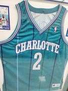 Larry Johnson Autographed Framed and Matted Charlotte Hornets Jersey (Front Signature)