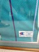 Larry Johnson Autographed Framed and Matted Charlotte Hornets Jersey (Front Signature)