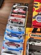Grouping of 1:64 Scale Matchbox and Hot Wheel Die Cast Cars