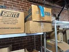 Contents of New Stock Room includes New Steel Toe Rubber Boots, New Gloves, New Food Trays, New Floor Mats, New Protective Face Sheilds, New Carts, and all Shelving