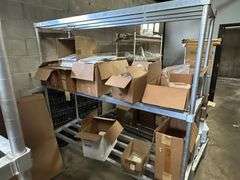Contents of New Stock Room includes New Steel Toe Rubber Boots, New Gloves, New Food Trays, New Floor Mats, New Protective Face Sheilds, New Carts, and all Shelving