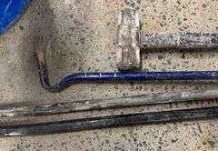 Grouping of Pry Bars and Sledge Hammer