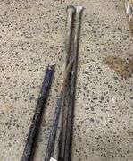 Grouping of Pry Bars and Sledge Hammer