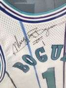 Tyrone "Muggsy" Bogues Autographed Framed and Matted Charlotte Hornets Jersey