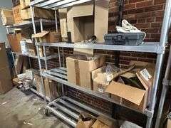 Contents of New Stock Room includes New Steel Toe Rubber Boots, New Gloves, New Food Trays, New Floor Mats, New Protective Face Sheilds, New Carts, and all Shelving