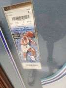 Tyrone "Muggsy" Bogues Autographed Framed and Matted Charlotte Hornets Jersey
