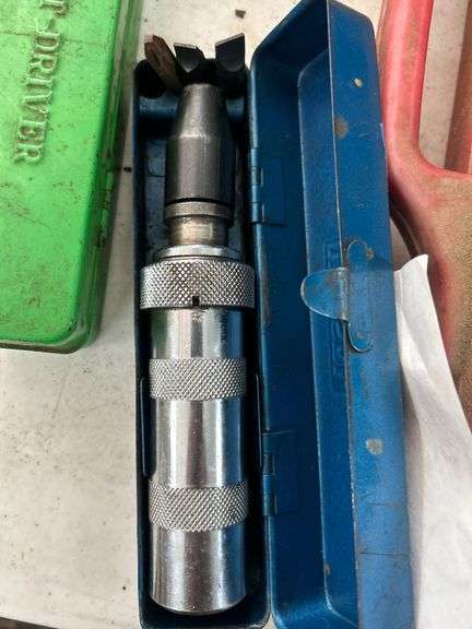 Two Hand Held Impact Drivers