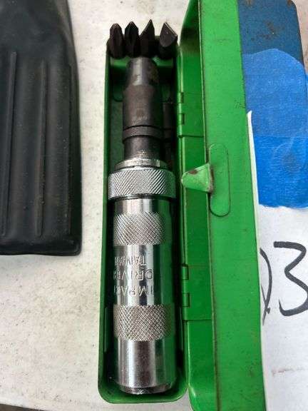 Two Hand Held Impact Drivers