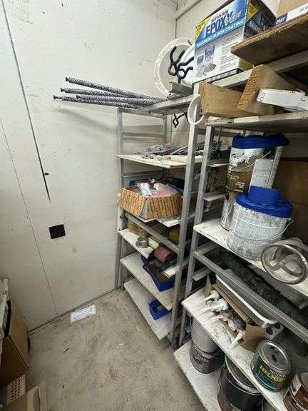Aluminum Storage Racks with Assorted Paints, Stains & Cleaning Supplies