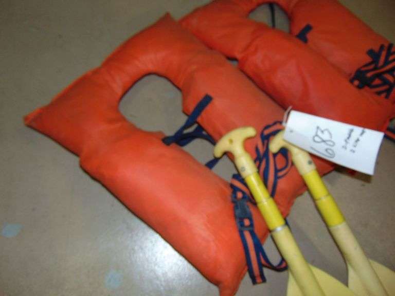 Two Life Jackets & 2 Paddles