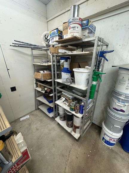 Aluminum Storage Racks with Assorted Paints, Stains & Cleaning Supplies