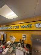 Large Lighted Sign on Wall