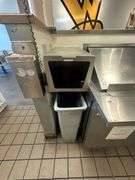Grouping of Wall Attached Storage including Deli Paper Dispenser, Cup/Lid/ Bag Holders