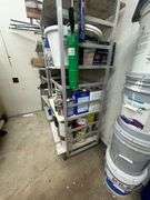 Aluminum Storage Racks with Assorted Paints, Stains & Cleaning Supplies