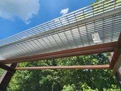 Grouping of Steel Pipe and Metal Grate