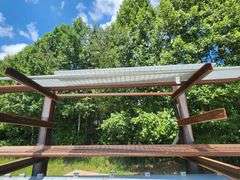Grouping of Steel Pipe and Metal Grate