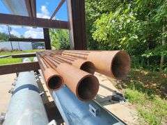Grouping of Steel Pipe and Metal Grate
