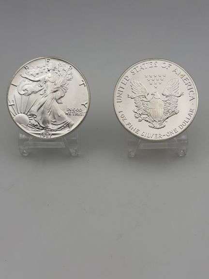 Pair of 1987 US Silver Eagle Dollar Coins image