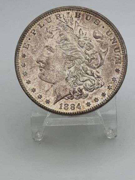 1884-CC Morgan Silver Dollar UNC TONED! image