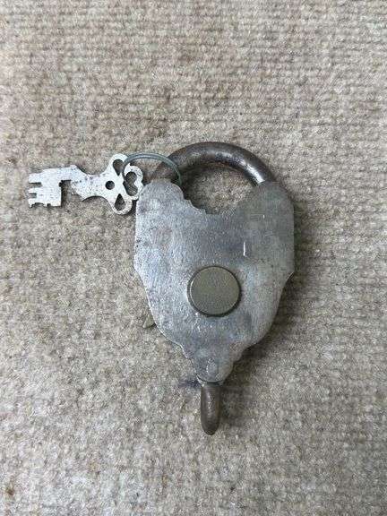 Ornate Metal Padlock with Key