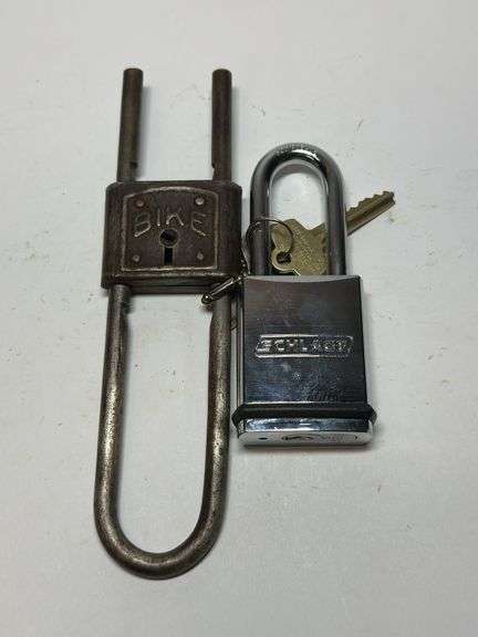 Two Padlocks: One Bike Lock and One Schlage Lock with Keys image