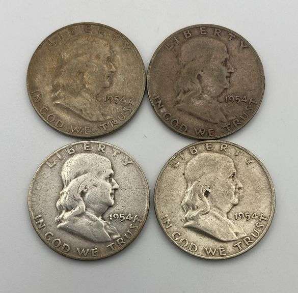 Lot of 4 Franklin Half Dollars image