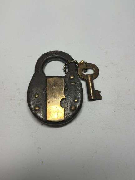Brass and Black Padlock with Key image