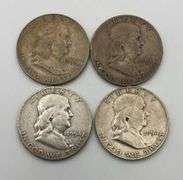 Lot of 4 Franklin Half Dollars