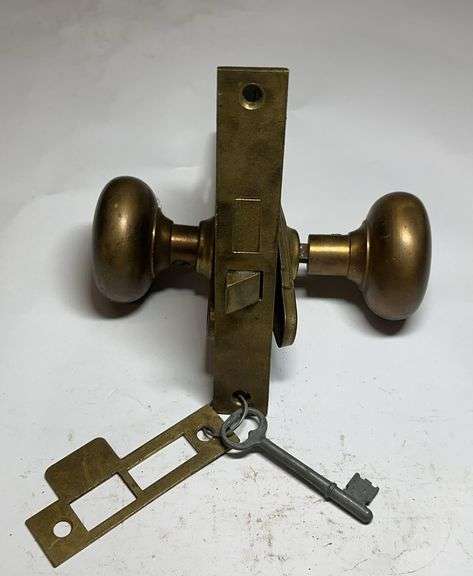 Vintage-Style Brass Door Knob Set with Key and Plates image
