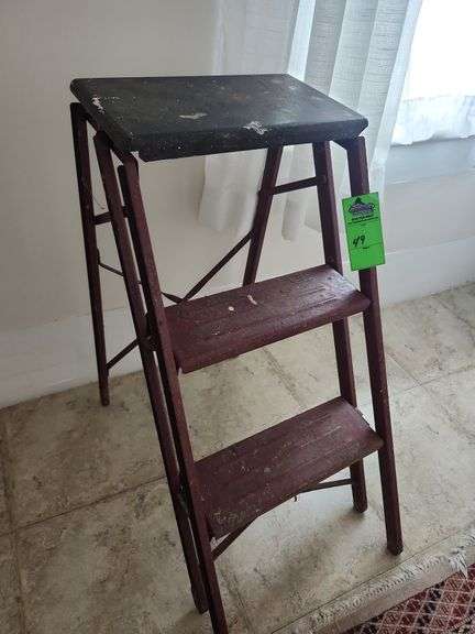 Antique metal step ladder