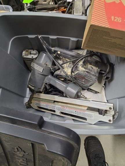 Husky tote w/belt sander and nail guns image