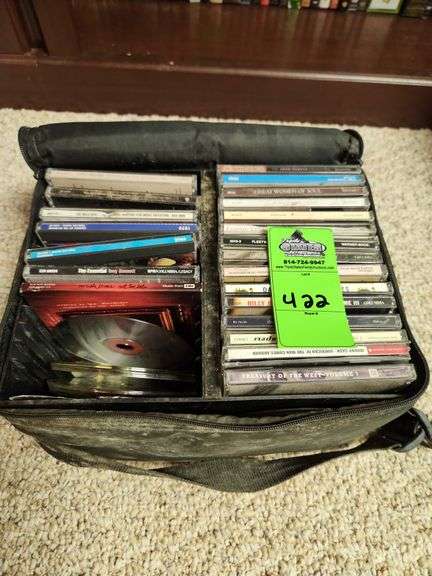 Assorted CDs with case image