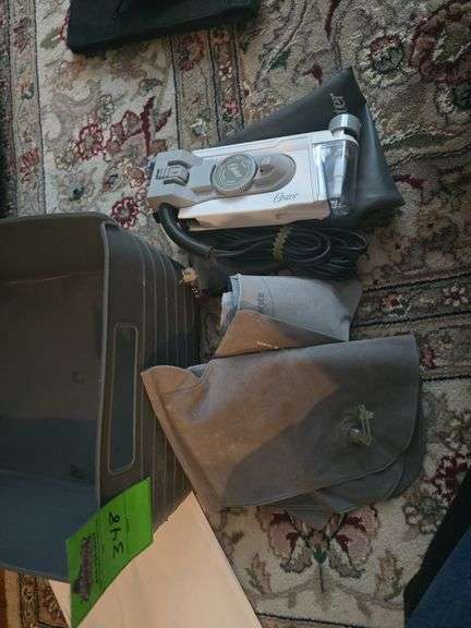 Miscellaneous trimmers, nail clippers, scissors, card holders, inflatable travel neck pillows and travel iron image