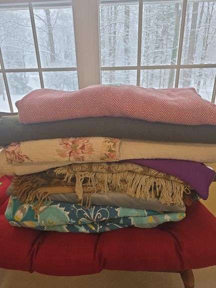 Assorted blankets, quilts, and throws image