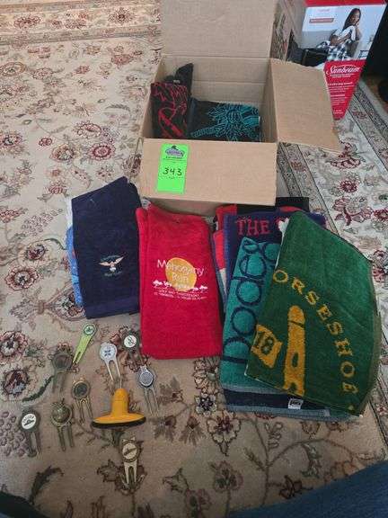 Assorted golf towels and accessories image