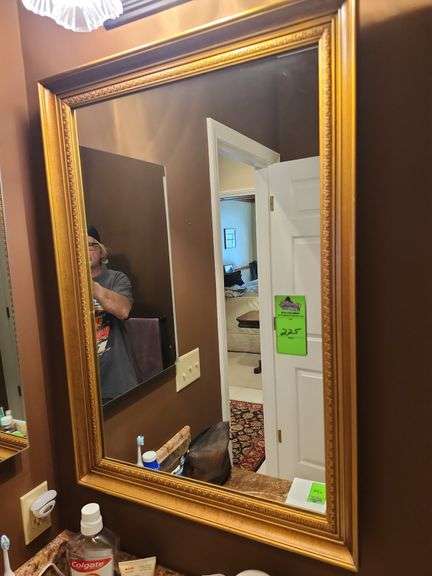 Mirror roughly 24 in by 34 in image