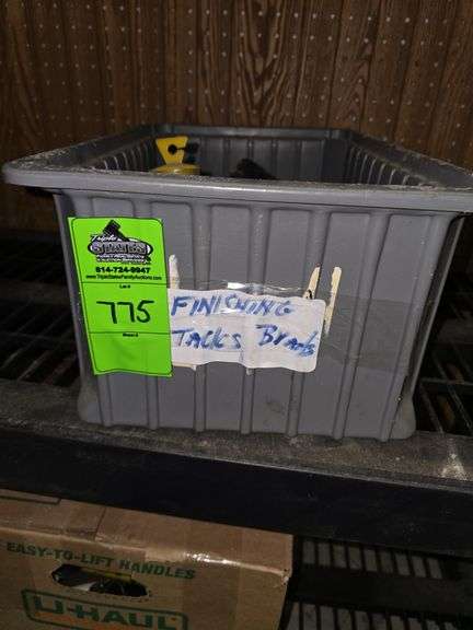 Bin of finishing tacks and nails image