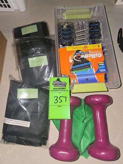 Razor refills, 3 large drawstring bags new, 2 hand weights and a resistance band image