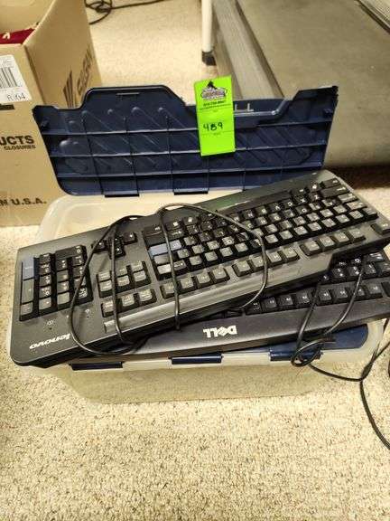 2 keyboards and miscellaneous cords image