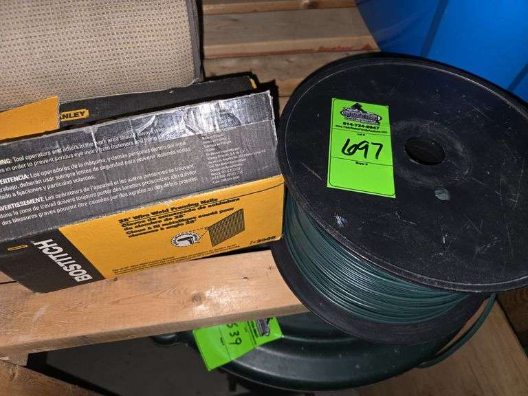 Spools of wire and box of framing nails image